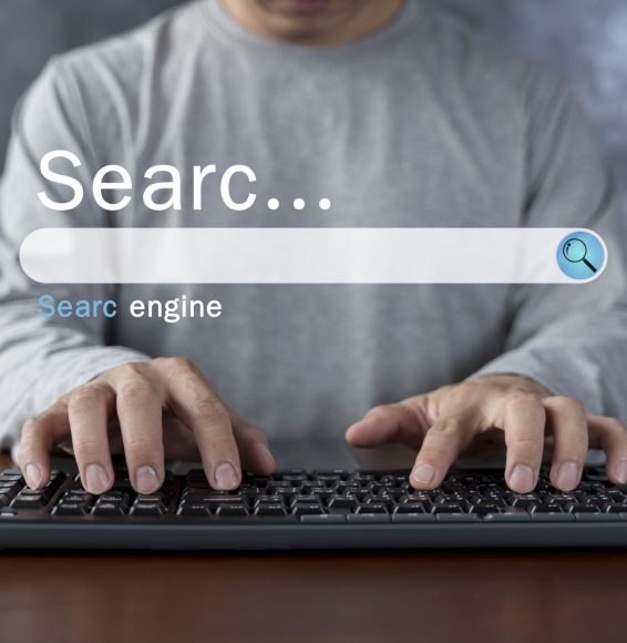 data-search-technology-search-engine-optimization-man-s-hands-are-using-computer-keyboard-searching-information-using-search-console-with-your-website-min